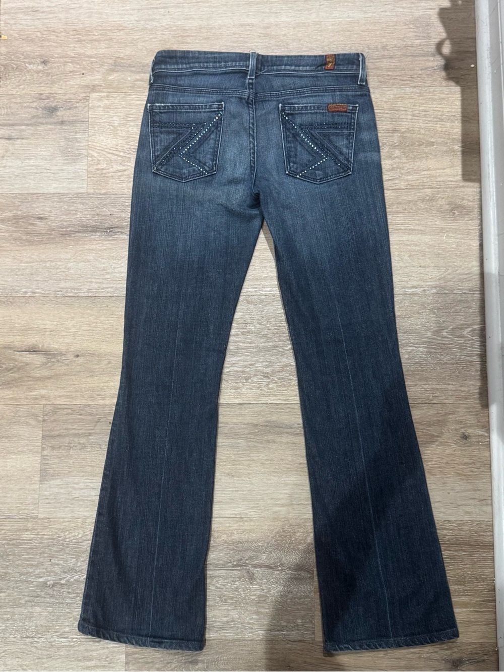 7 For All Mankind Women's Dark Indigo Flare Jeans with Studded Back Pockets